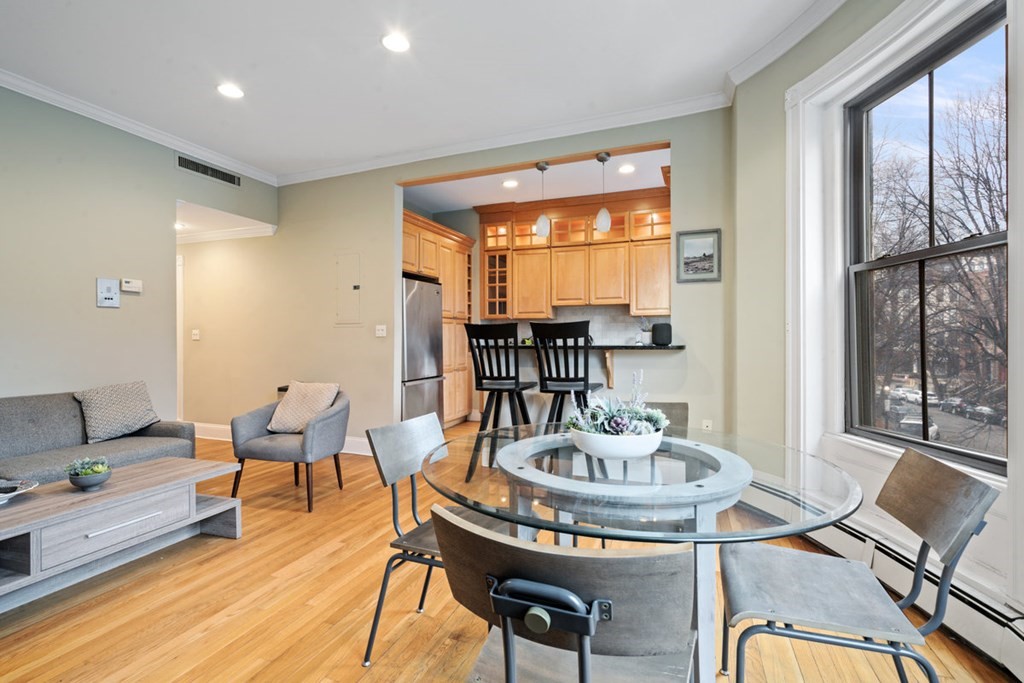 32 Union Park, Unit 2 Boston, MA 02118 - Photo 5 of 19 a living room with furniture and a table