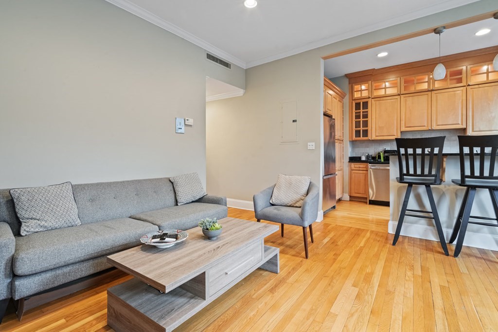 32 Union Park, Unit 2 Boston, MA 02118 - Photo 6 of 19 a living room with furniture and a table