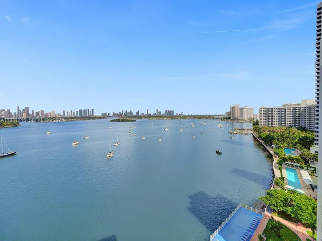 a view of a city with tall buildings