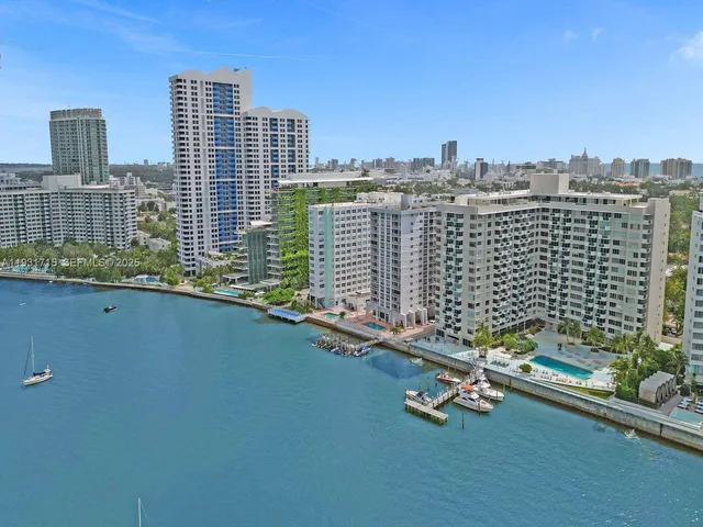 a view of city with tall buildings