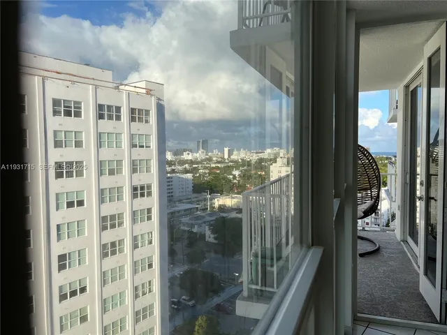 a kitchen with stainless steel appliances granite countertop a stove a microwave and a sink