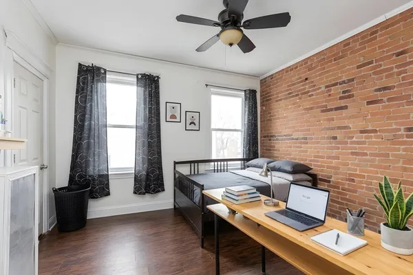 a workspace with furniture and a window