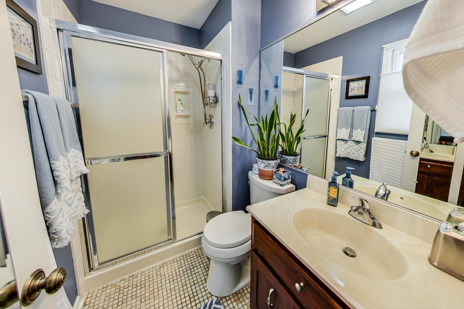 N440 Kimball Road Winfield, IL 60190 - Photo 13 of 21 a bathroom with a sink toilet and shower
