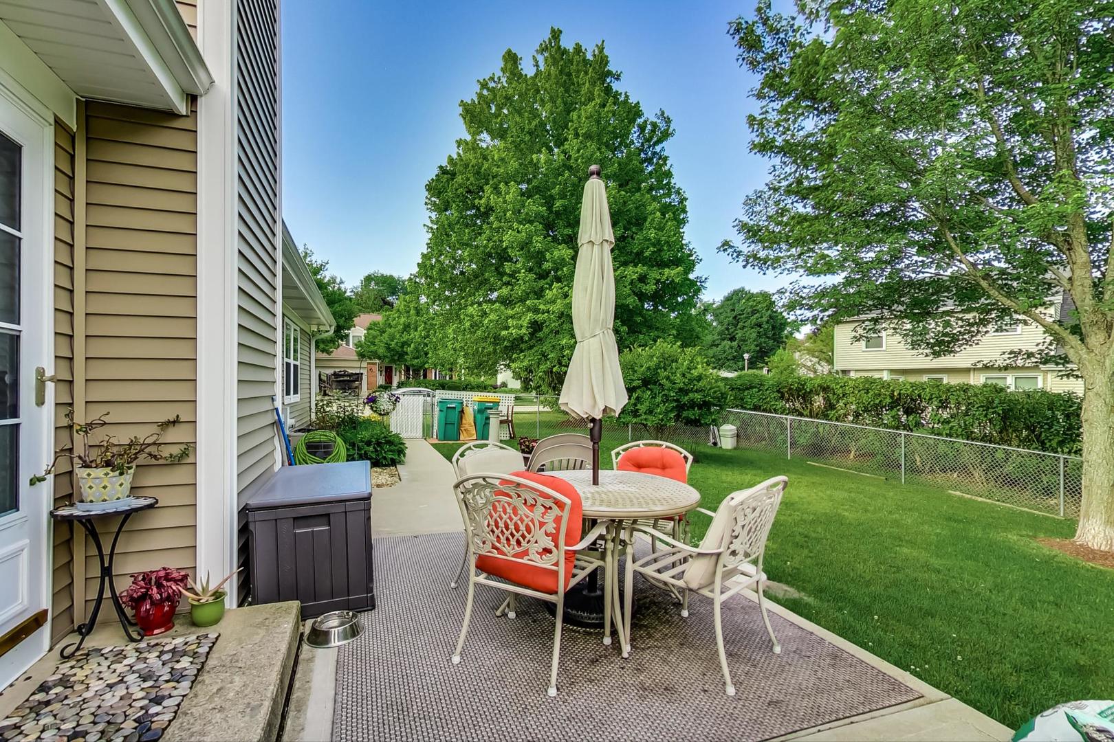 N440 Kimball Road Winfield, IL 60190 - Photo 17 of 21 a view of a chairs and table in the patio