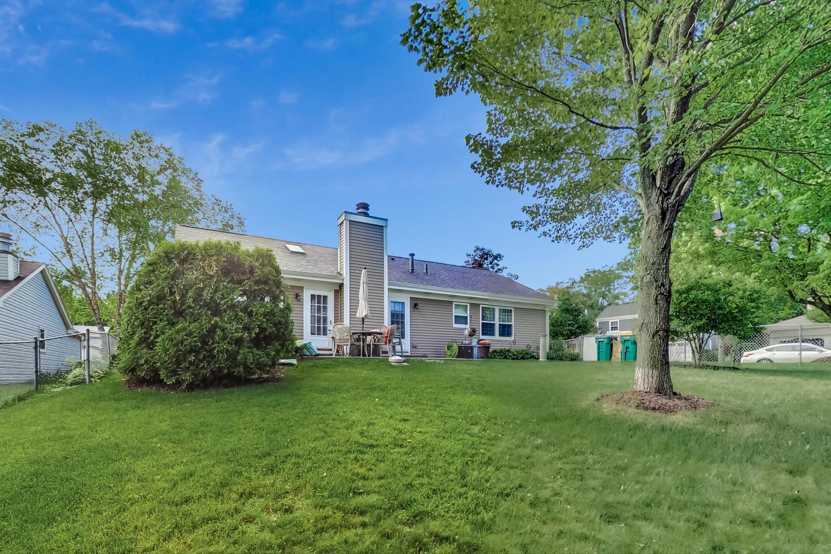N440 Kimball Road Winfield, IL 60190 - Photo 19 of 21 a view of a house with a yard