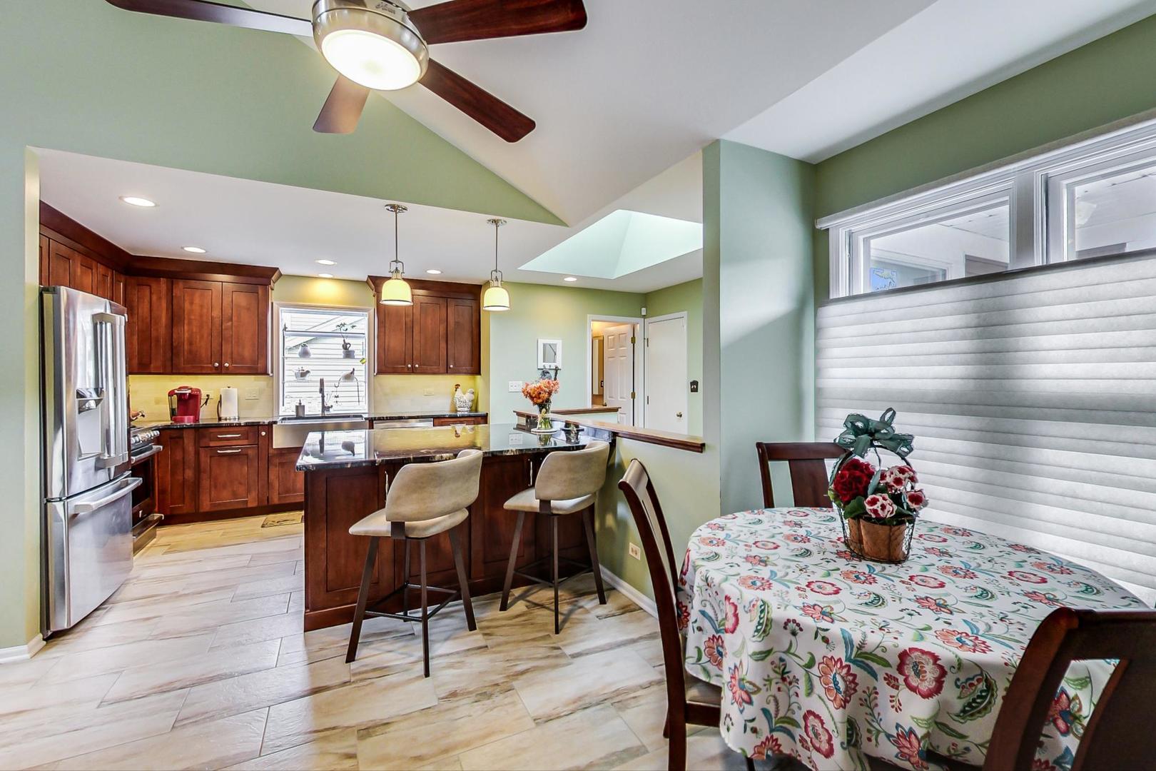 N440 Kimball Road Winfield, IL 60190 - Photo 9 of 21 a view of a dining room with furniture