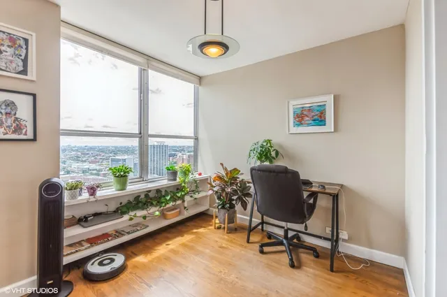 a living room with furniture and a window