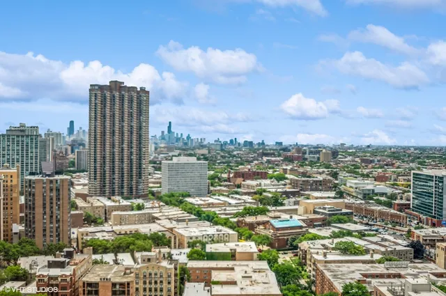 a patio with a table and chairs