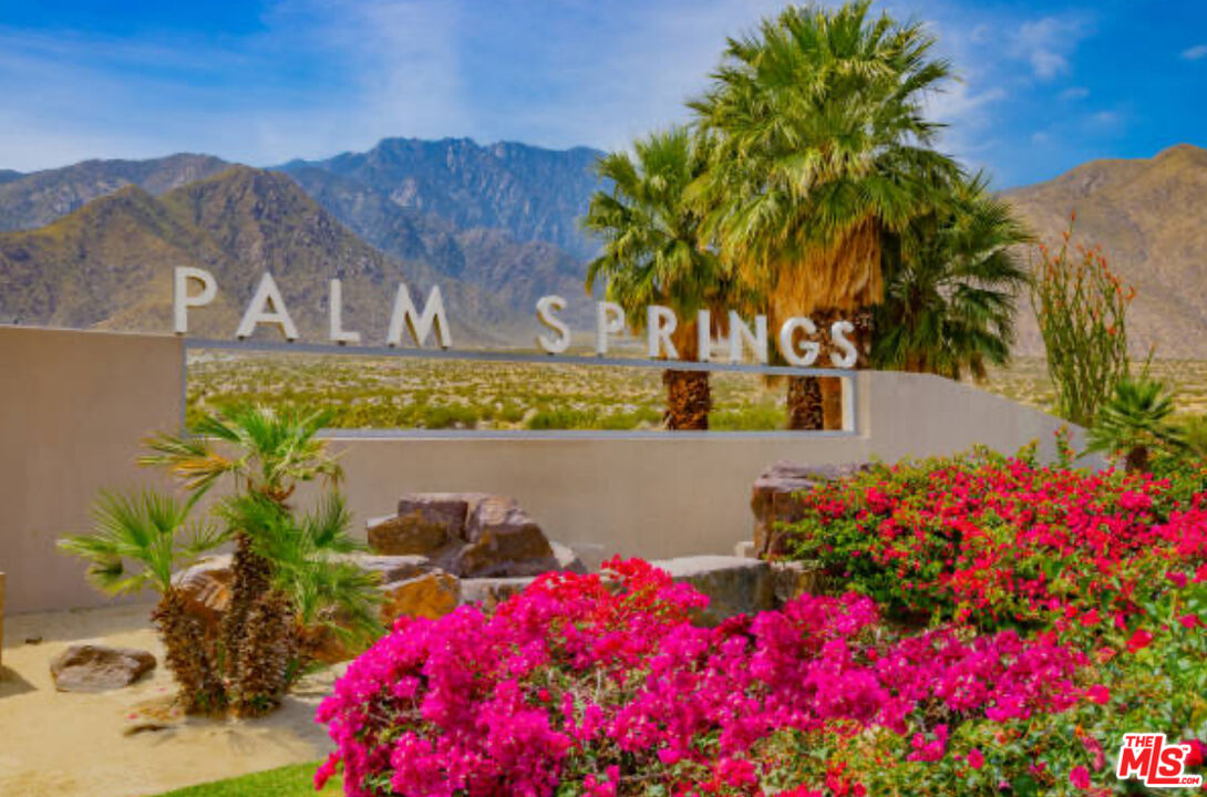 2146 North Blando Road Palm Springs, CA 92262 - Photo 2 of 31 a view of a house with a lot of flower plants