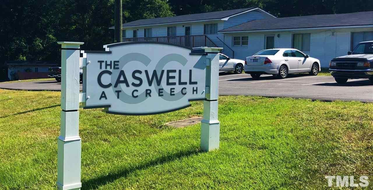 1400 Creech Road, Unit 4 Garner, NC 27529 - Photo 12 of 13 a front view of a house with garden