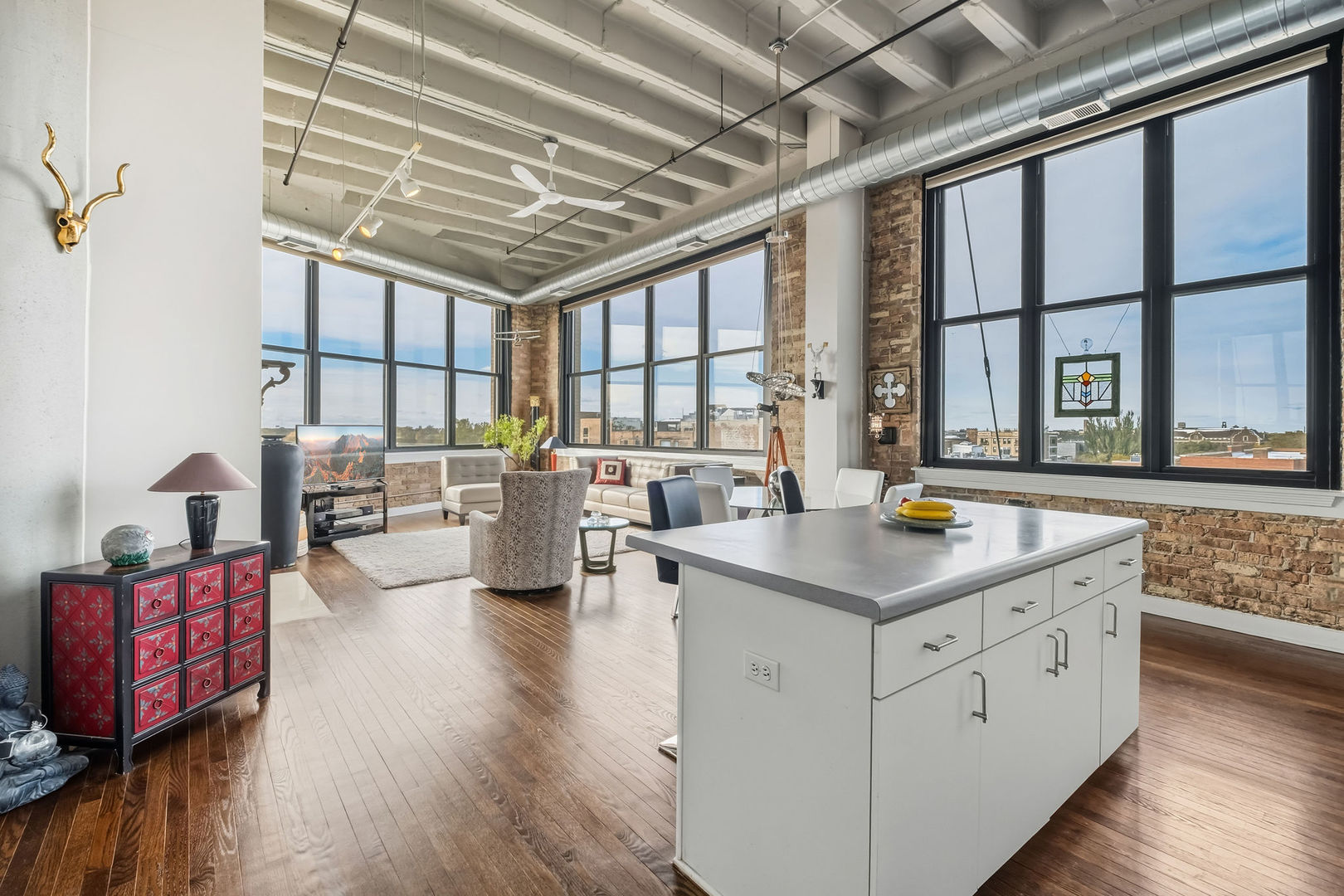 1601 West School Street, Unit 511 Chicago, IL 60657 - Photo 2 of 23 a view of living room with furniture and floor to ceiling window