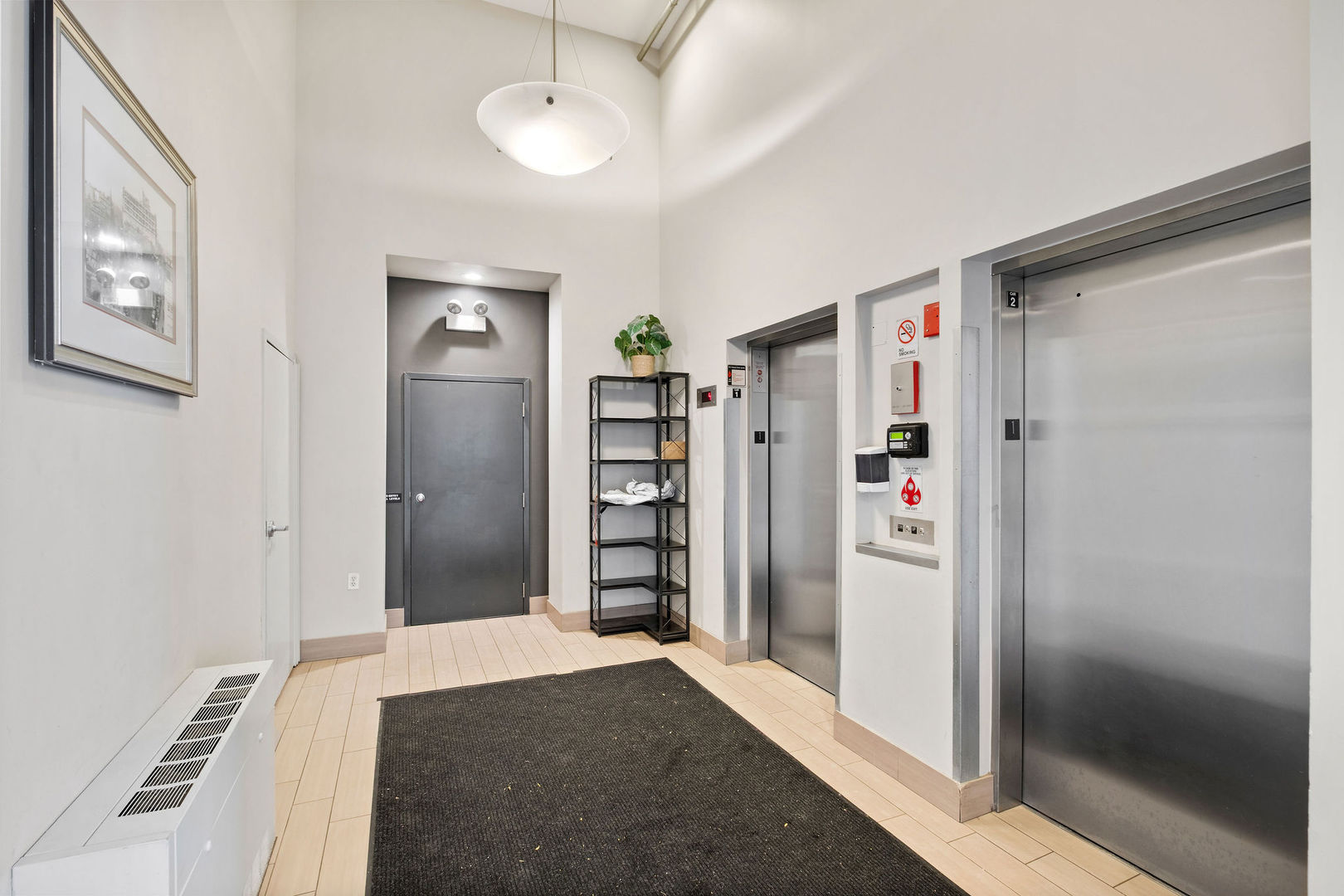 1601 West School Street, Unit 511 Chicago, IL 60657 - Photo 22 of 23 a bedroom with a bed and a closet