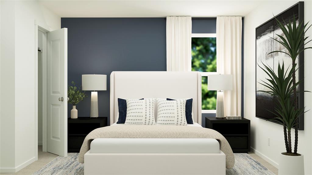 1004 Calley Pear Trail Princeton, TX 75407 - Photo 2 of 7 a bedroom with a bed a fireplace and a large window