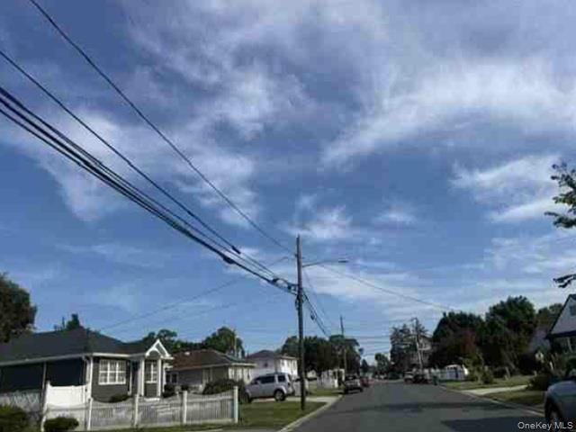 330 Amerigo Vespucci Avenue Copiague, NY 11726 - Photo 3 of 3 a view of a city