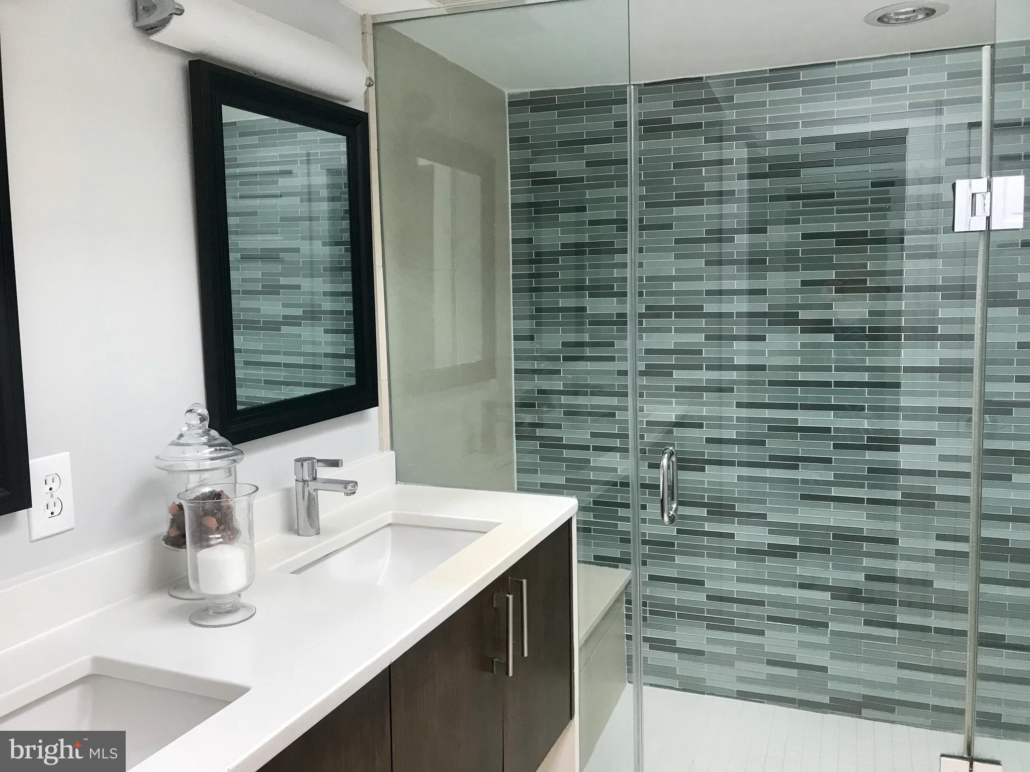906 G Street Southeast Washington, DC 20003 - Photo 13 of 28 a bathroom with a sink and a mirror