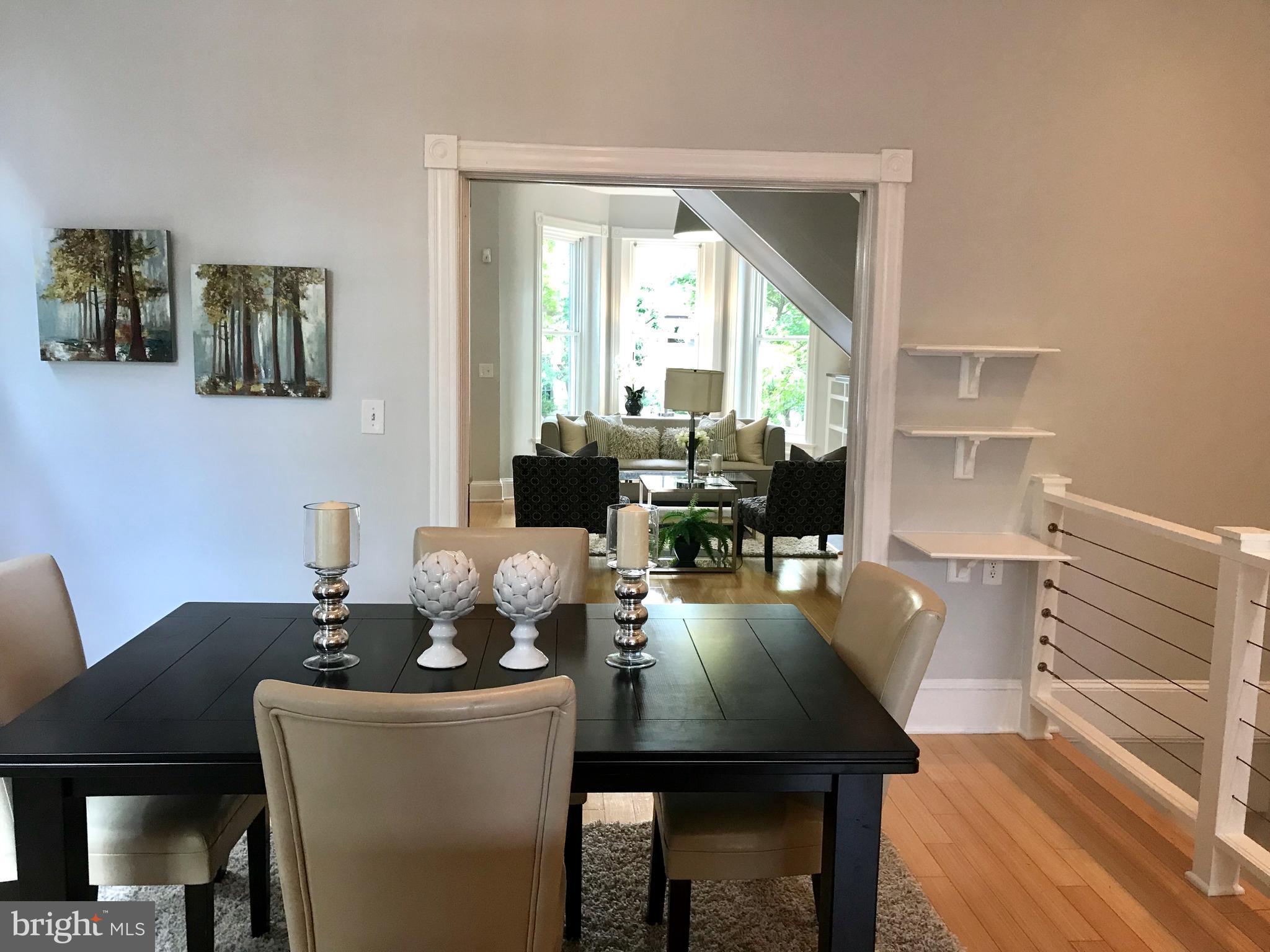 906 G Street Southeast Washington, DC 20003 - Photo 5 of 28 a dining room with furniture and wooden floor