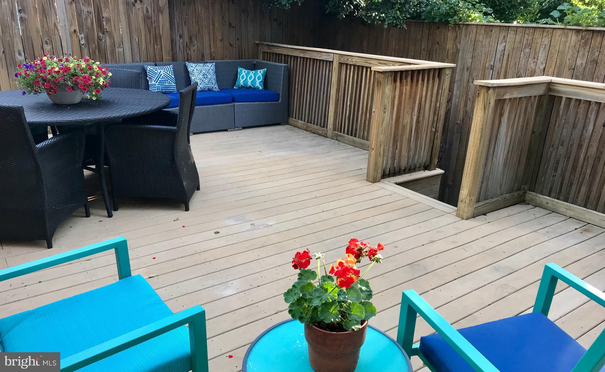 906 G Street Southeast Washington, DC 20003 - Photo 9 of 28 a view of a chairs and table on the wooden floor