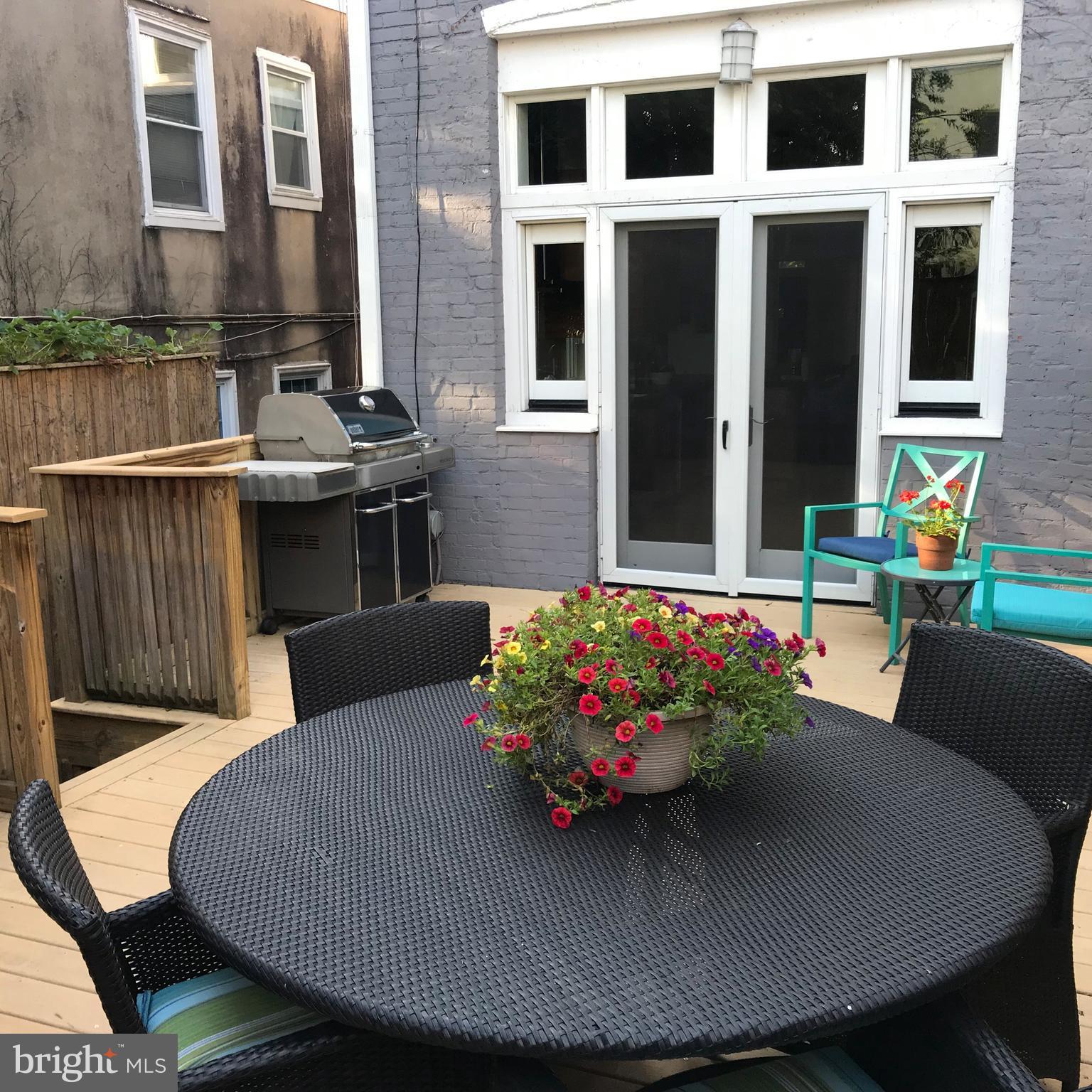 906 G Street Southeast Washington, DC 20003 - Photo 10 of 28 a front view of a house with a porch