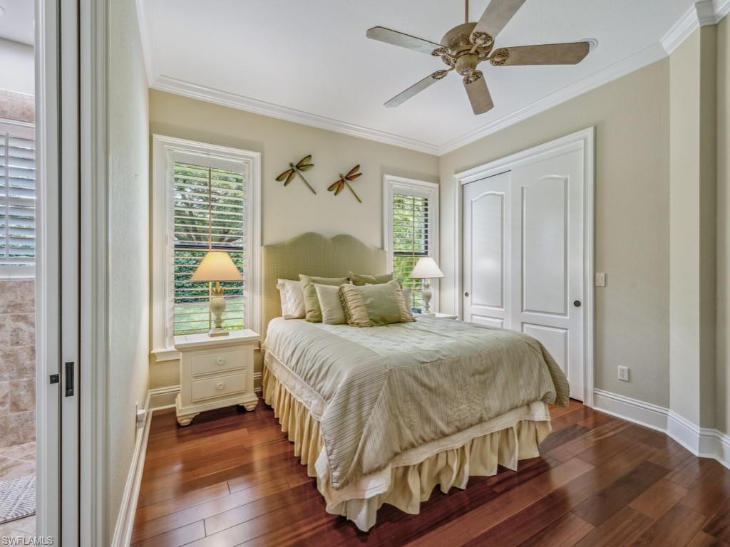 16509 Cellini Lane Naples, FL 34110 - Photo 17 of 49 a bedroom with a bed and a window