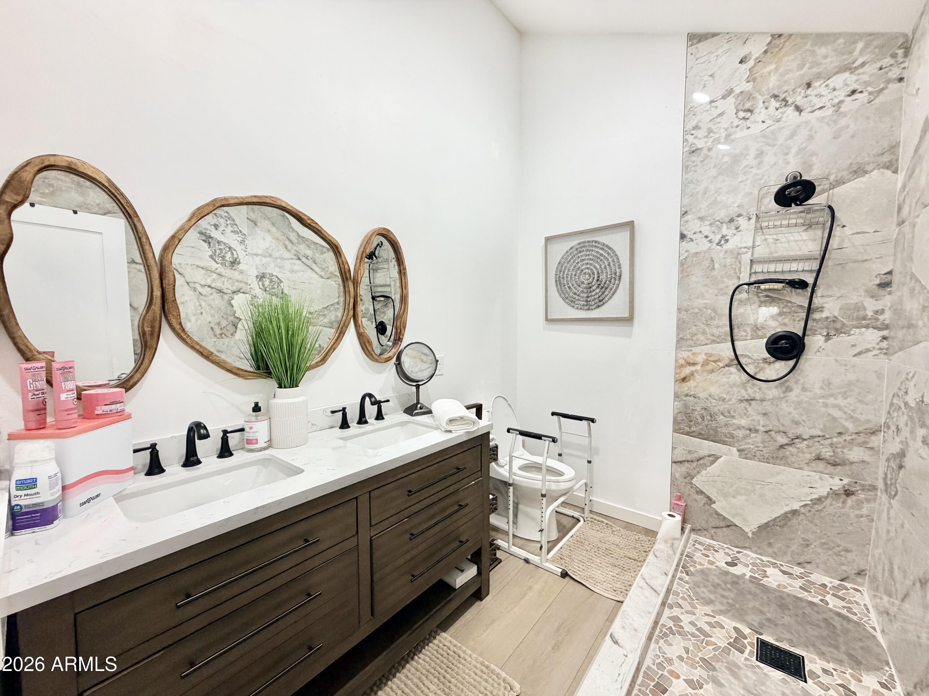 1925 Rock Castle Drive Prescott, AZ 86305 - Photo 12 of 25 a bathroom with a double vanity sink mirror and toilet