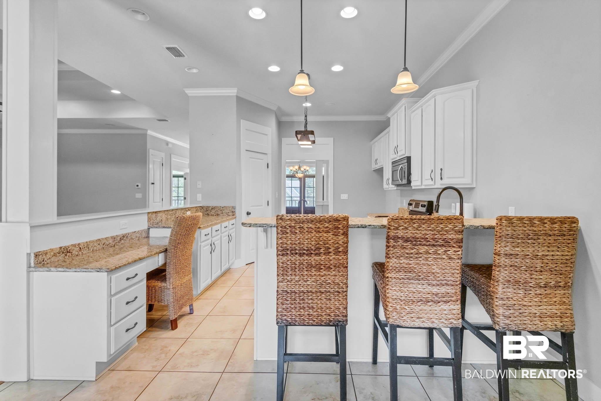7854 Raegan Lane Daphne, AL 36527 - Photo 17 of 70 Kitchen featuring stainless steel appliances, a peninsula, crown molding, white cabinetry, and recessed lighting