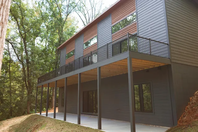 a backyard of a house with seating space