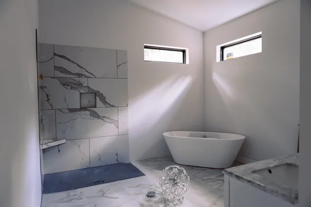 a view of a house with a door and wooden floor