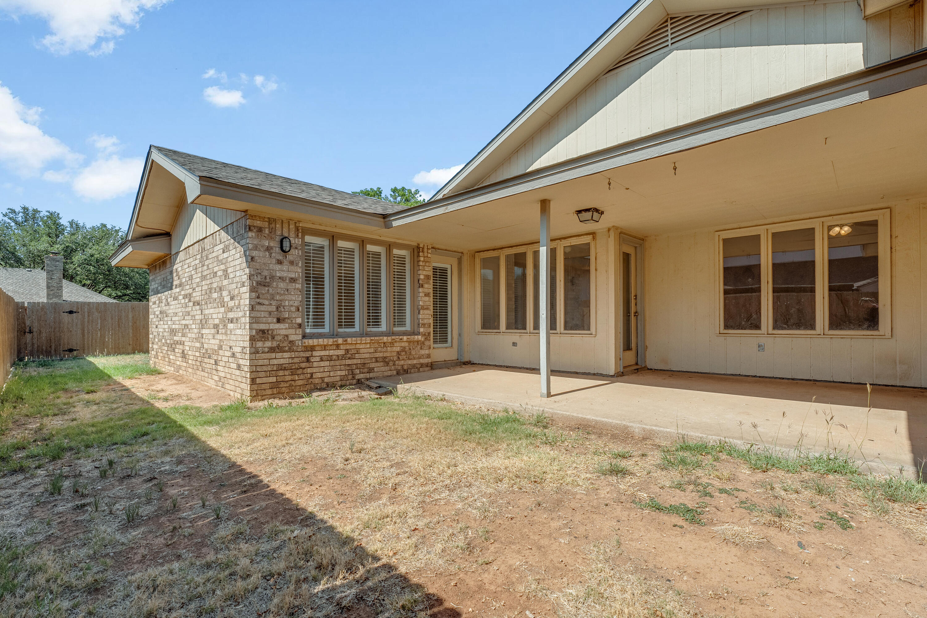 5221 84th Street Lubbock, TX 79424 - Photo 26 of 26 a view of house with backyard and tree
