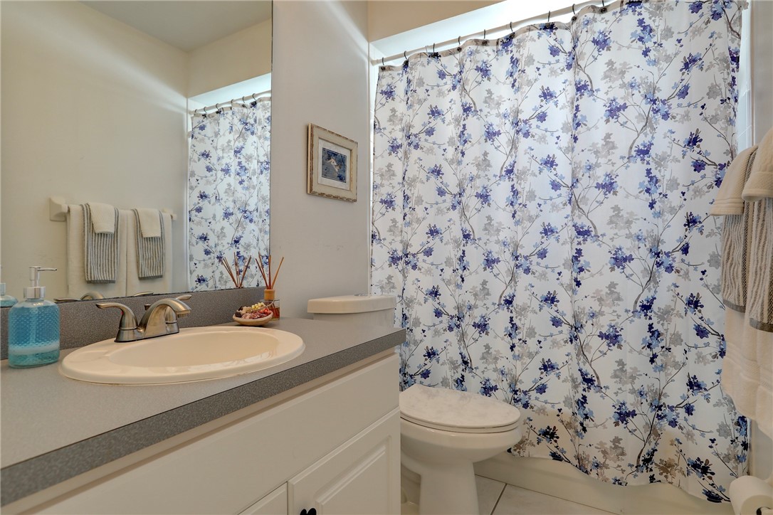 406 Perch Lane Sebastian, FL 32958 - Photo 17 of 27 a bathroom with a sink toilet and shower