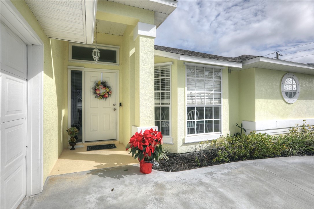 406 Perch Lane Sebastian, FL 32958 - Photo 2 of 27 a front view of a house with a porch