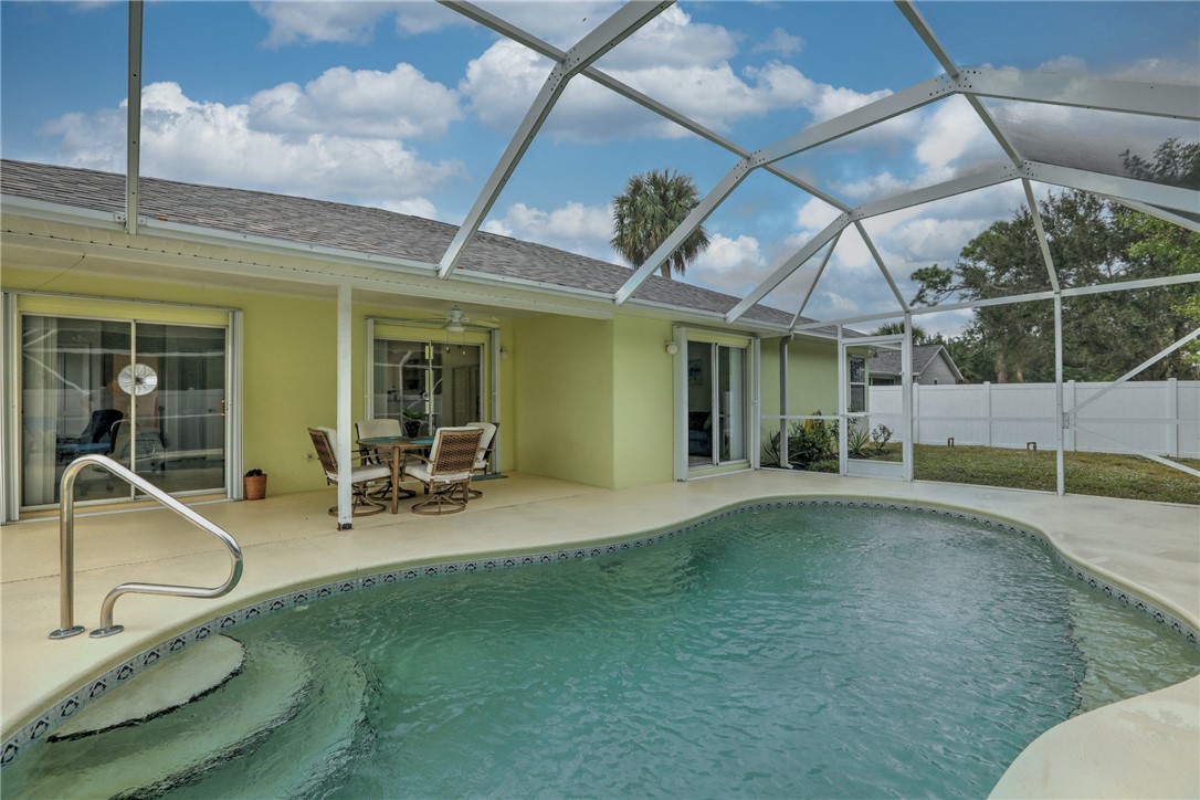 406 Perch Lane Sebastian, FL 32958 - Photo 23 of 27 a view of a house with backyard and porch