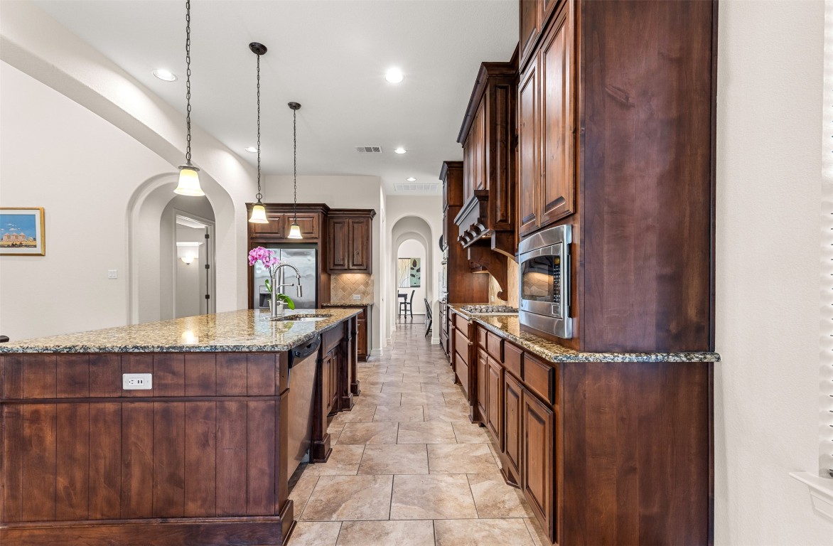 1916 Buffalo Speedway Leander, TX 78641 - Photo 15 of 30 a kitchen with lots of counter top space