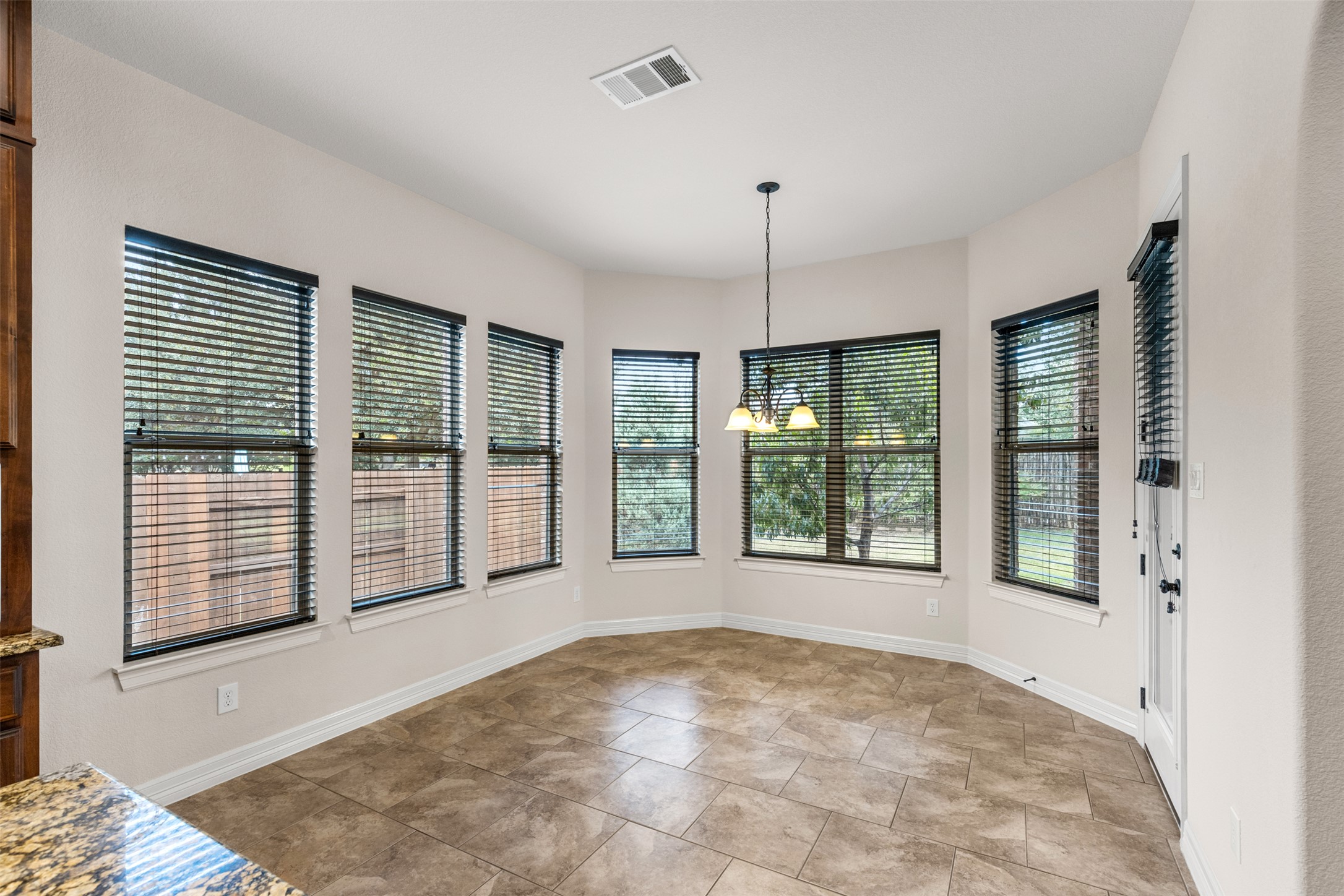 1916 Buffalo Speedway Leander, TX 78641 - Photo 16 of 31 a view of an empty room with a balcony