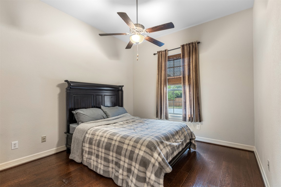 1916 Buffalo Speedway Leander, TX 78641 - Photo 24 of 30 a bedroom with a bed and a window
