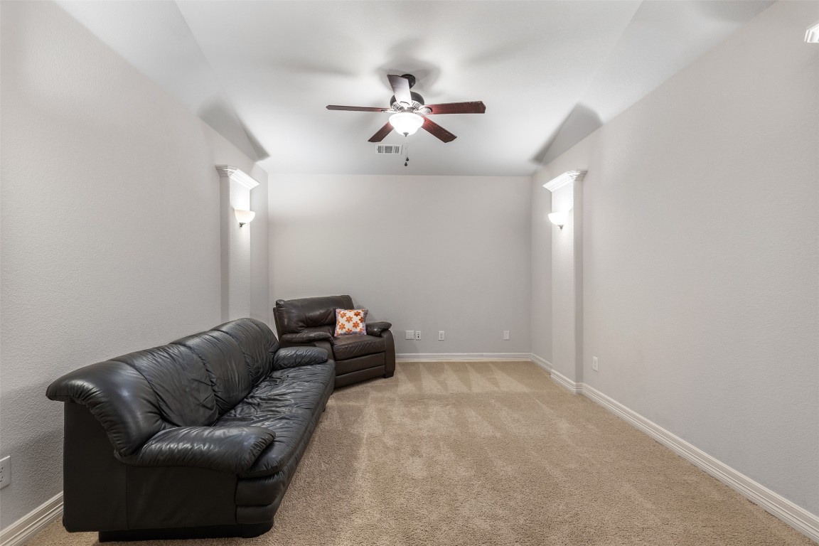 1916 Buffalo Speedway Leander, TX 78641 - Photo 7 of 30 a living room with furniture and white walls