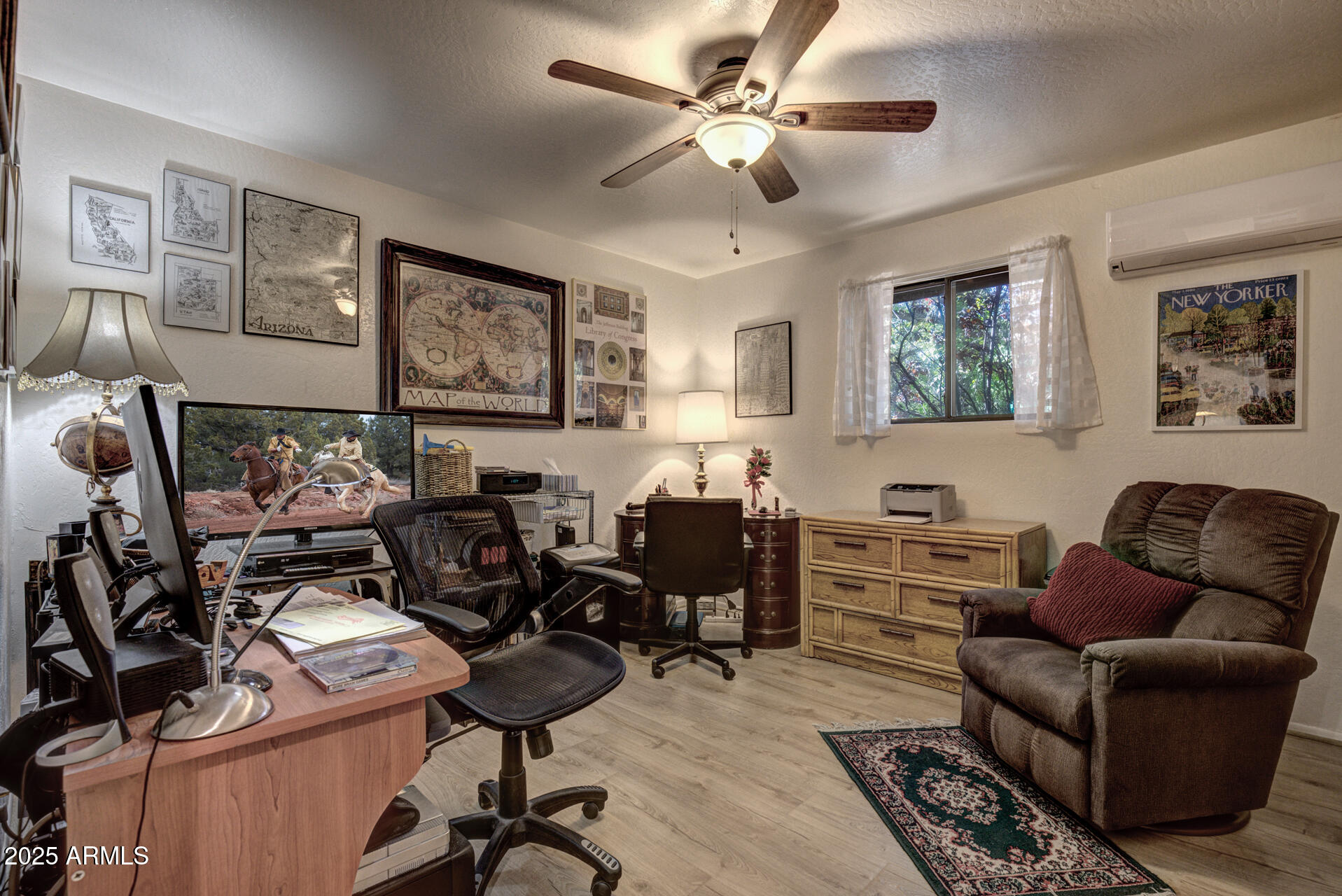 9019 Pinon Lane Pine, AZ 85544 - Photo 20 of 34 a view of a livingroom with workspace and a couch