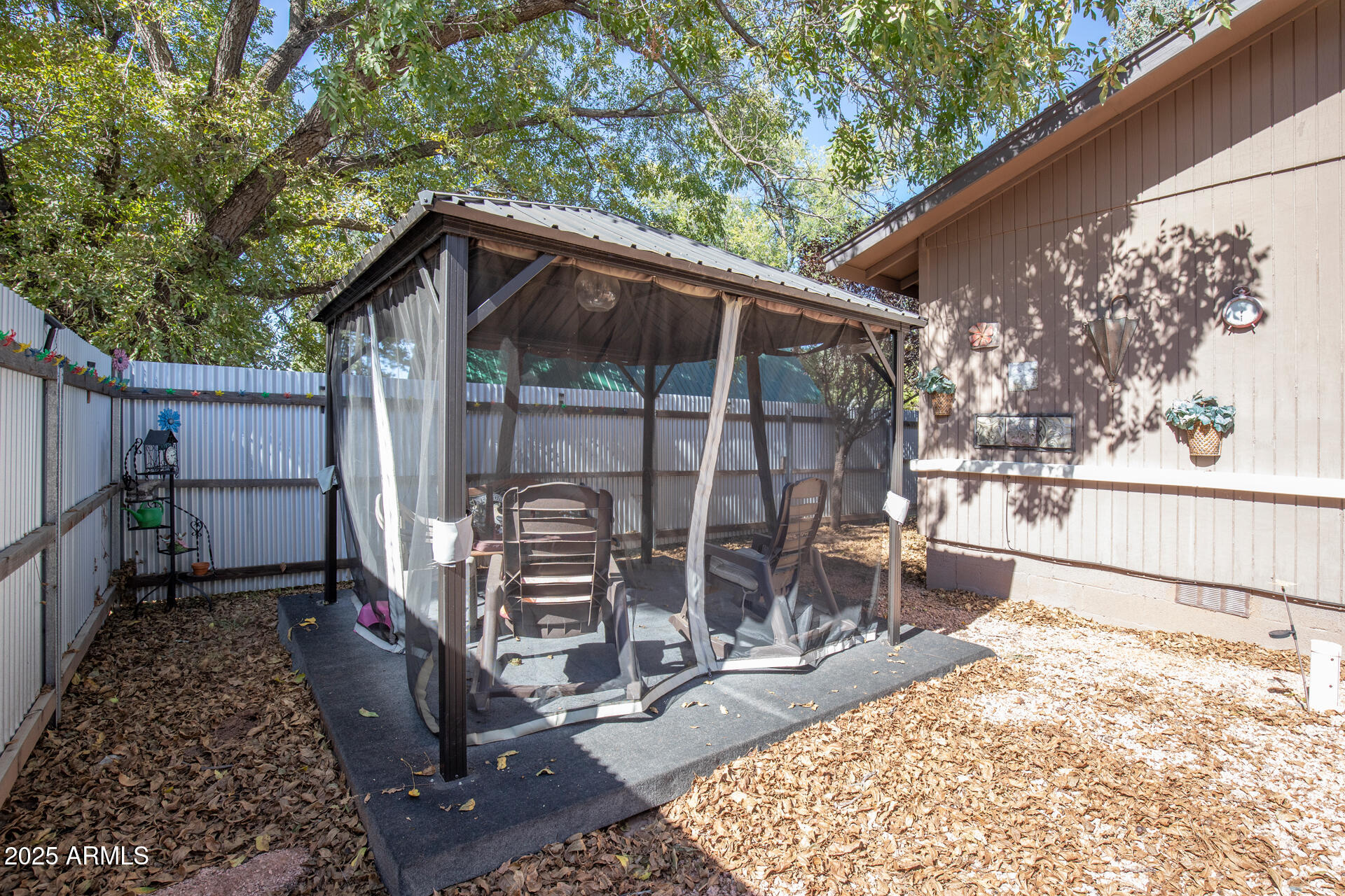 9019 Pinon Lane Pine, AZ 85544 - Photo 24 of 34 a house with trees in the background