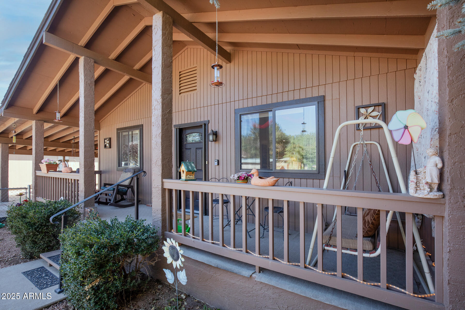 9019 Pinon Lane Pine, AZ 85544 - Photo 33 of 34 a view of a porch with furniture and garden