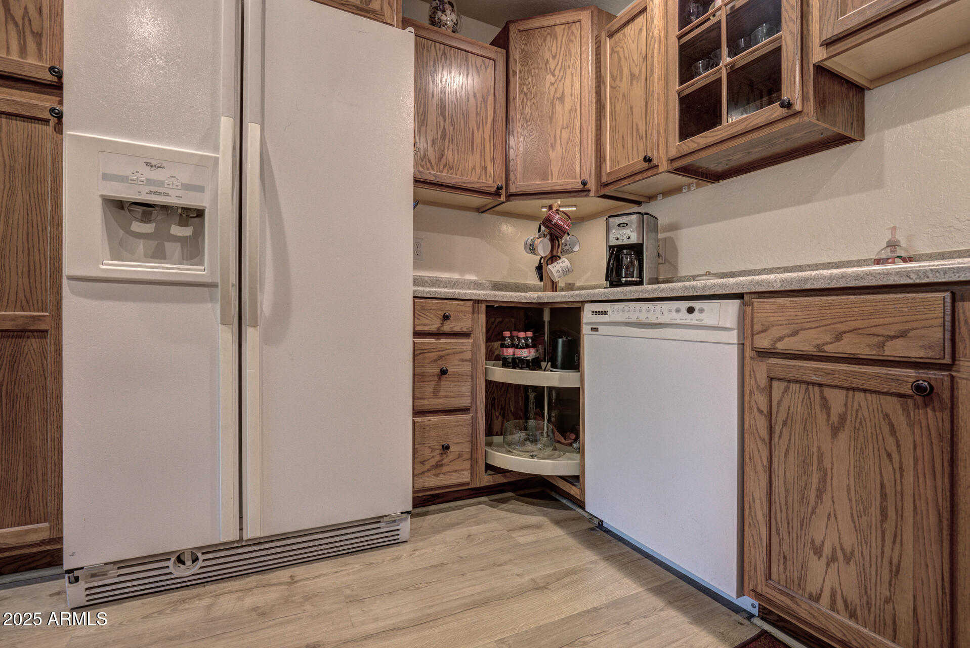 9019 Pinon Lane Pine, AZ 85544 - Photo 9 of 34 a kitchen with stainless steel appliances a refrigerator and cabinets