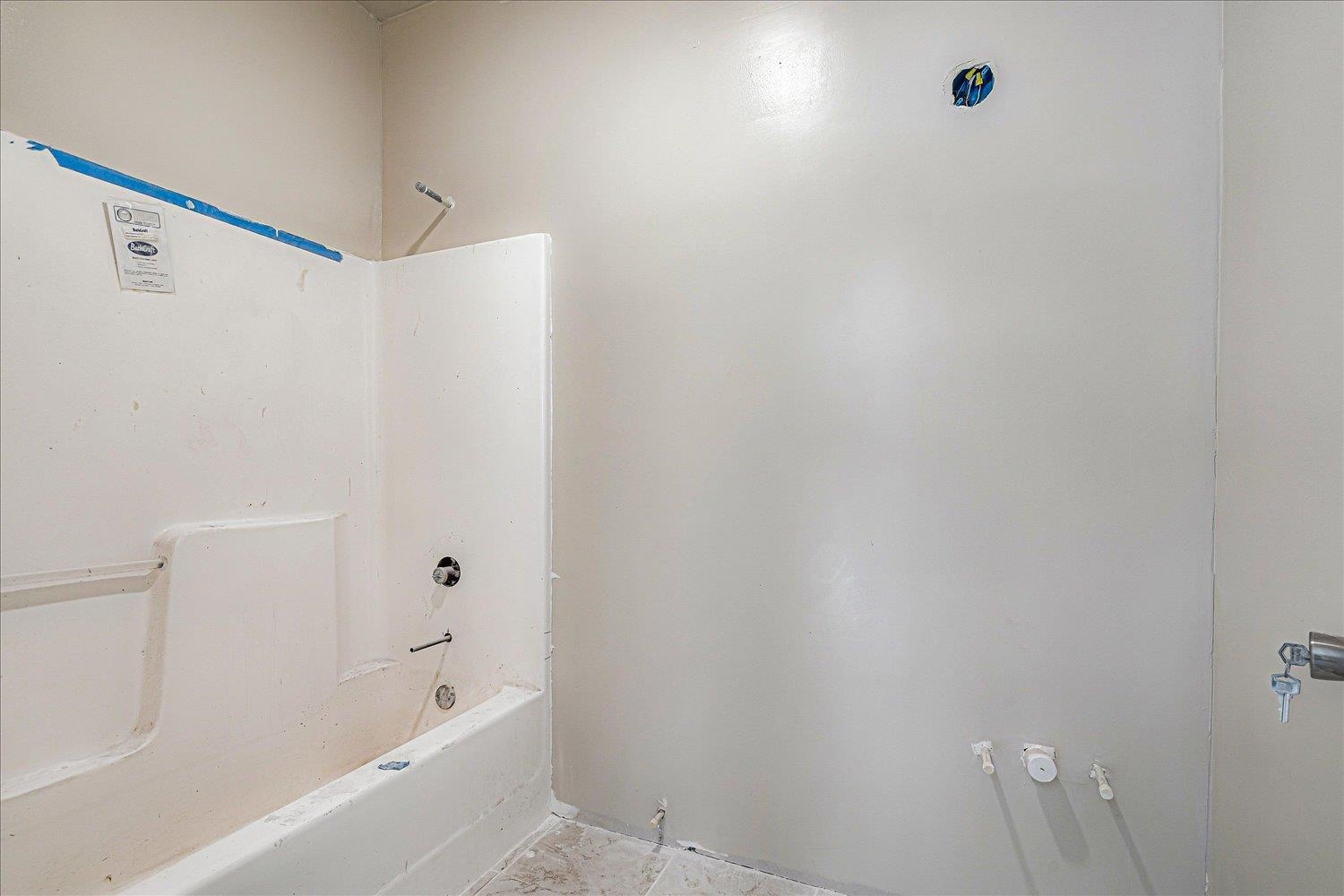 7723 Reese Road Memphis, TN 38133 - Photo 25 of 33 a bathroom with a bathtub and a shower