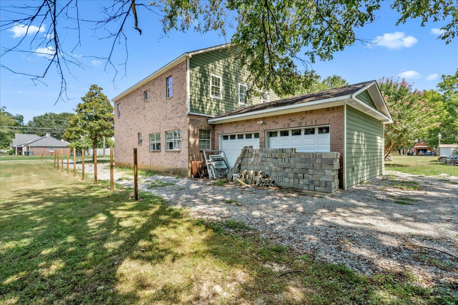 7723 Reese Road Memphis, TN 38133 - Photo 30 of 33 a view of a house with backyard