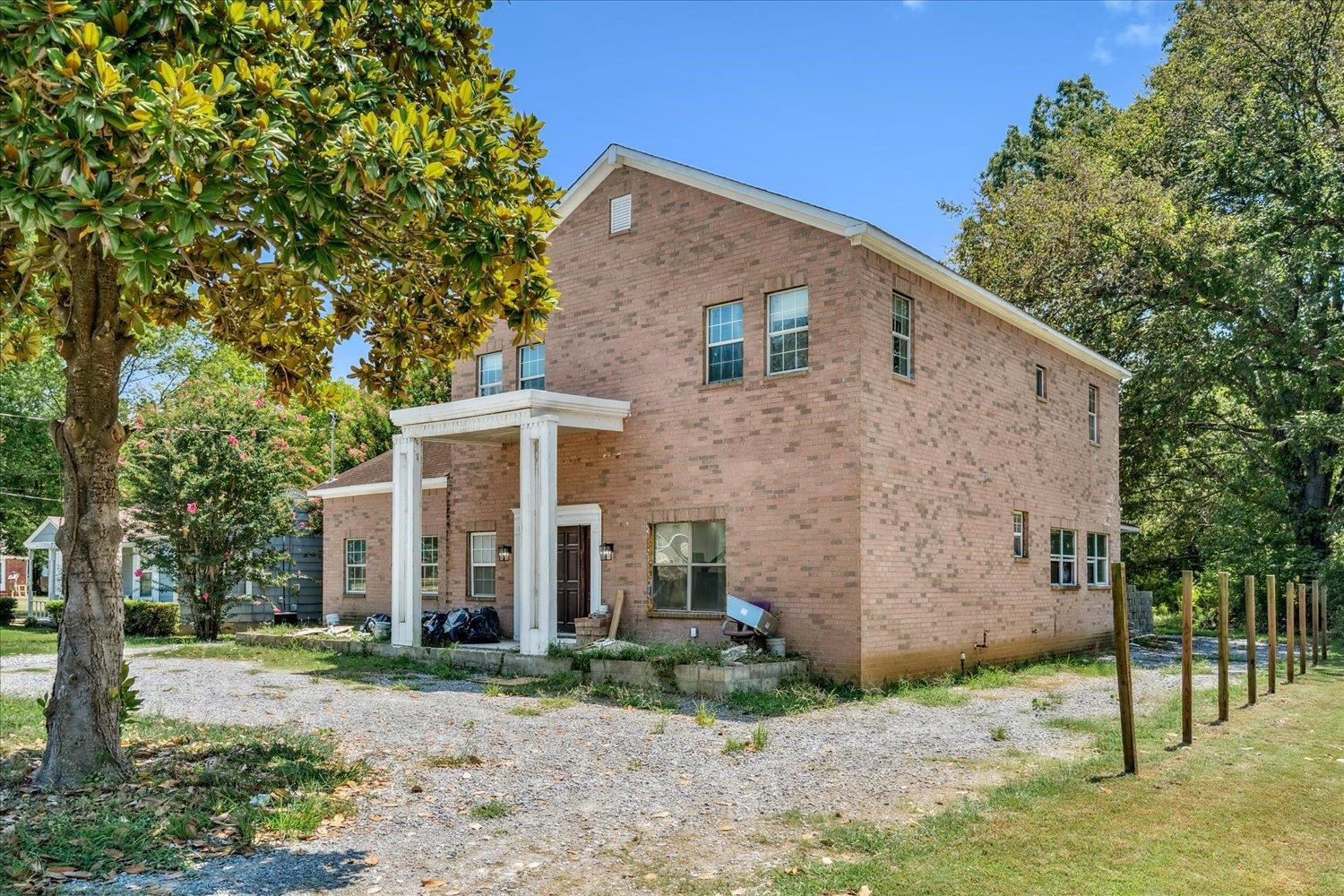 7723 Reese Road Memphis, TN 38133 - Photo 4 of 33 a view of a house with a yard