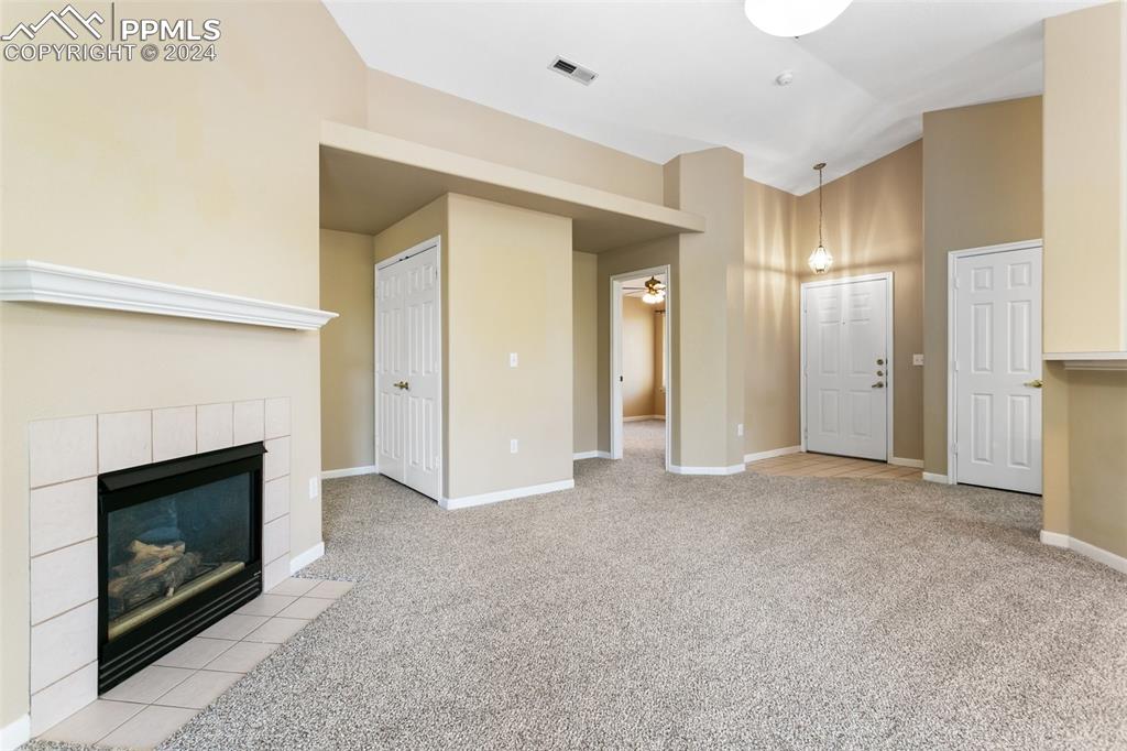 3831 Riviera Grove, Unit 204 Colorado Springs, CO 80922 - Photo 12 of 35 a view of empty room with a fireplace