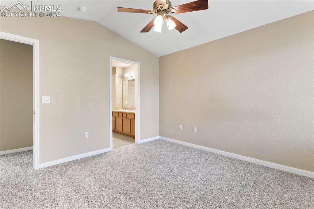 3831 Riviera Grove, Unit 204 Colorado Springs, CO 80922 - Photo 20 of 35 an empty room with closet and windows