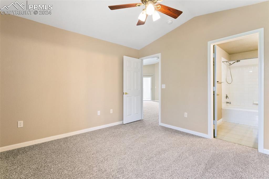 3831 Riviera Grove, Unit 204 Colorado Springs, CO 80922 - Photo 21 of 35 an empty room with a bathroom