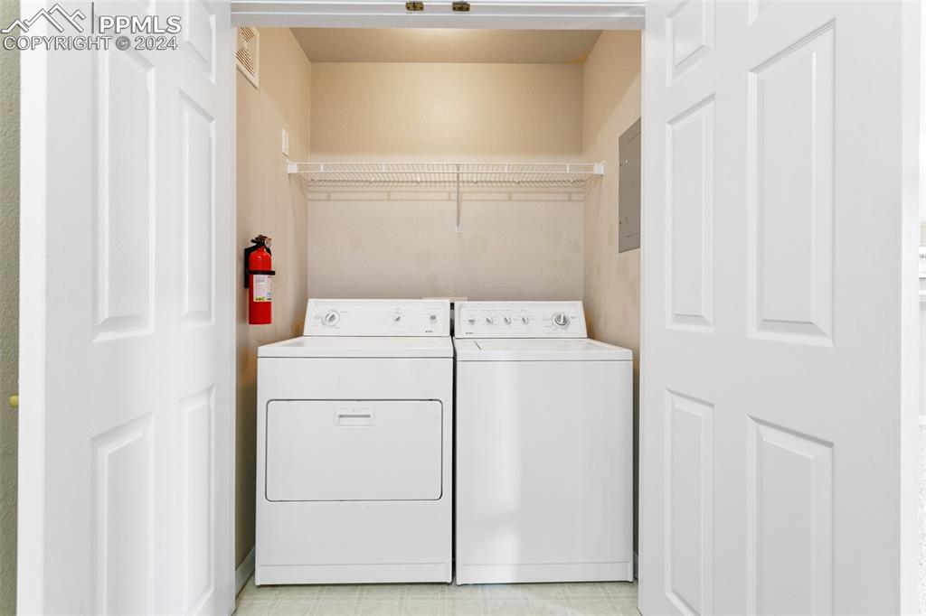 3831 Riviera Grove, Unit 204 Colorado Springs, CO 80922 - Photo 33 of 35 a utility room with dryer and washer