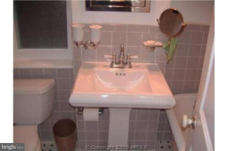 313 Marvin Road Silver Spring, MD 20901 - Photo 16 of 20 Custom expanded bath w/Kohler pedistal sink.