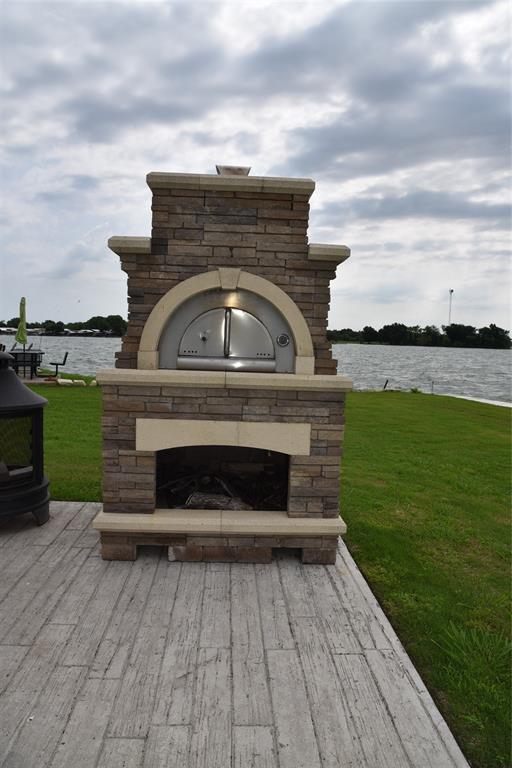 6465 Peninsula Road Kerens, TX 75144 - Photo 15 of 34 a view of a garden with an outdoor seating