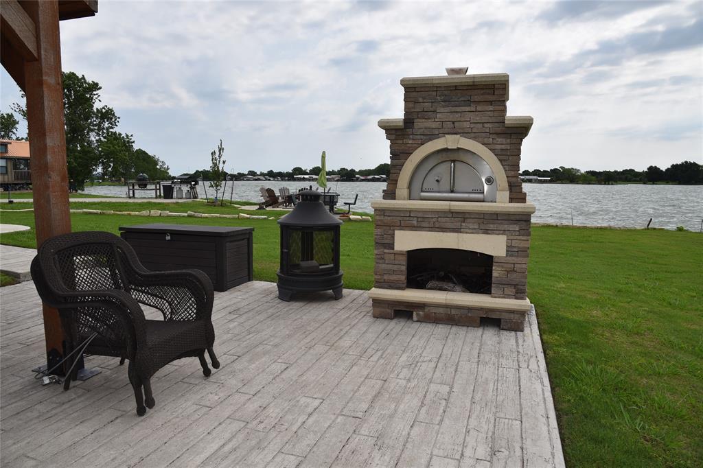 6465 Peninsula Road Kerens, TX 75144 - Photo 16 of 34 a view of a couches in patio of house