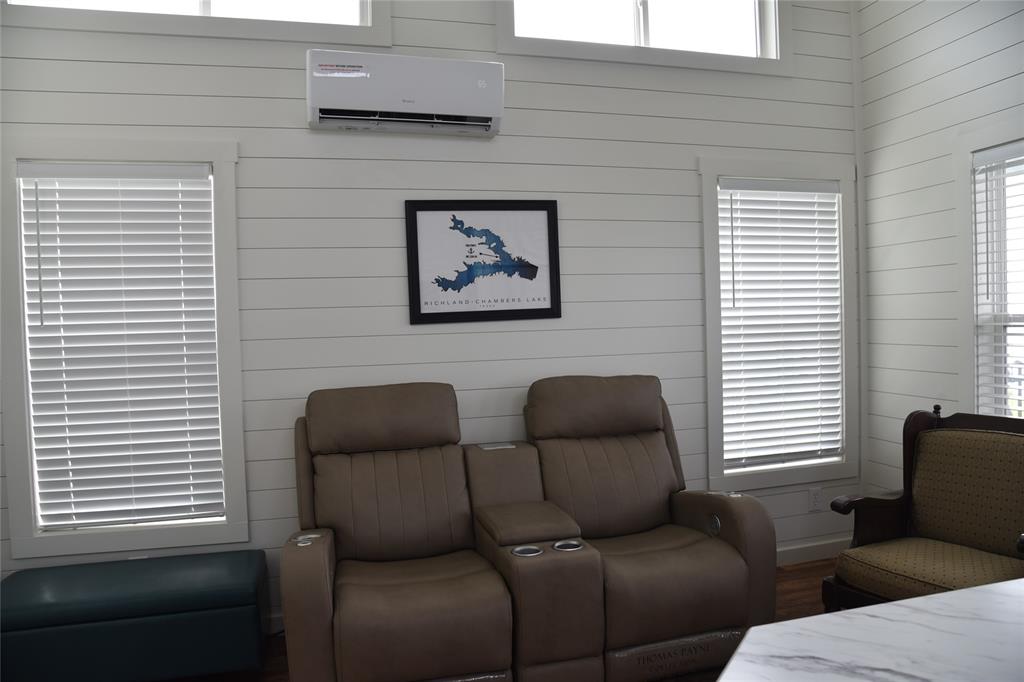 6465 Peninsula Road Kerens, TX 75144 - Photo 9 of 34 a couple of chairs sitting in front of a window